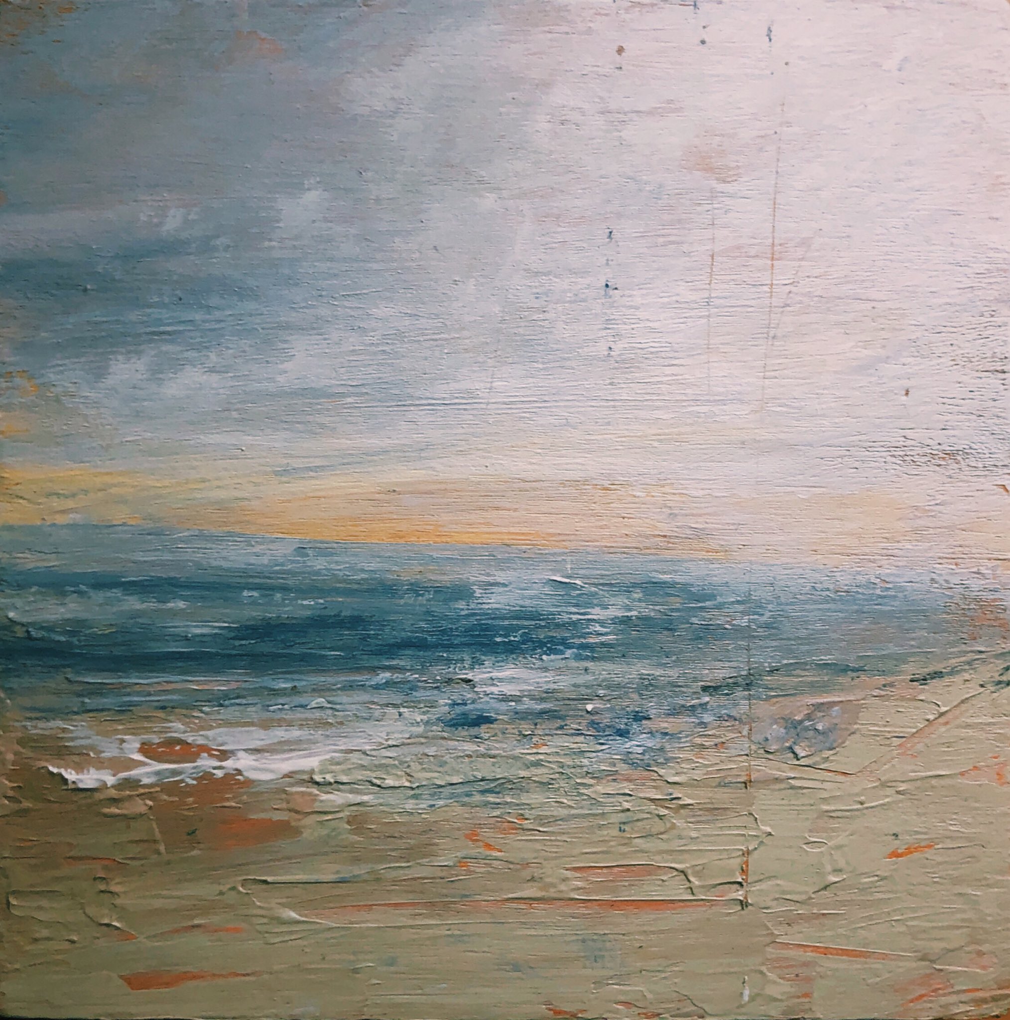 The calm sea greets the coast regularly