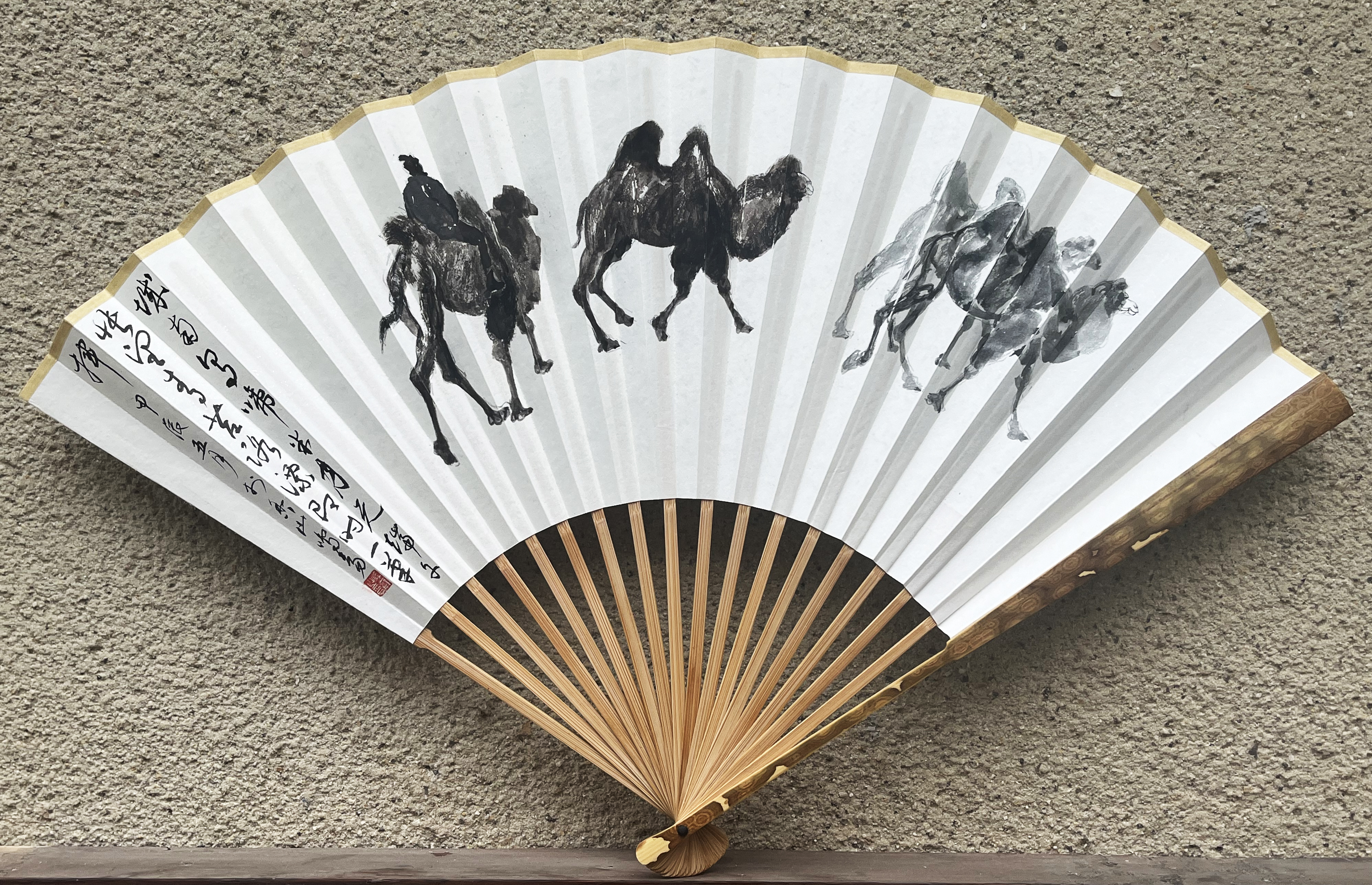 Gazing wistfully upon the austere and rugged road, with wind and sand as companions