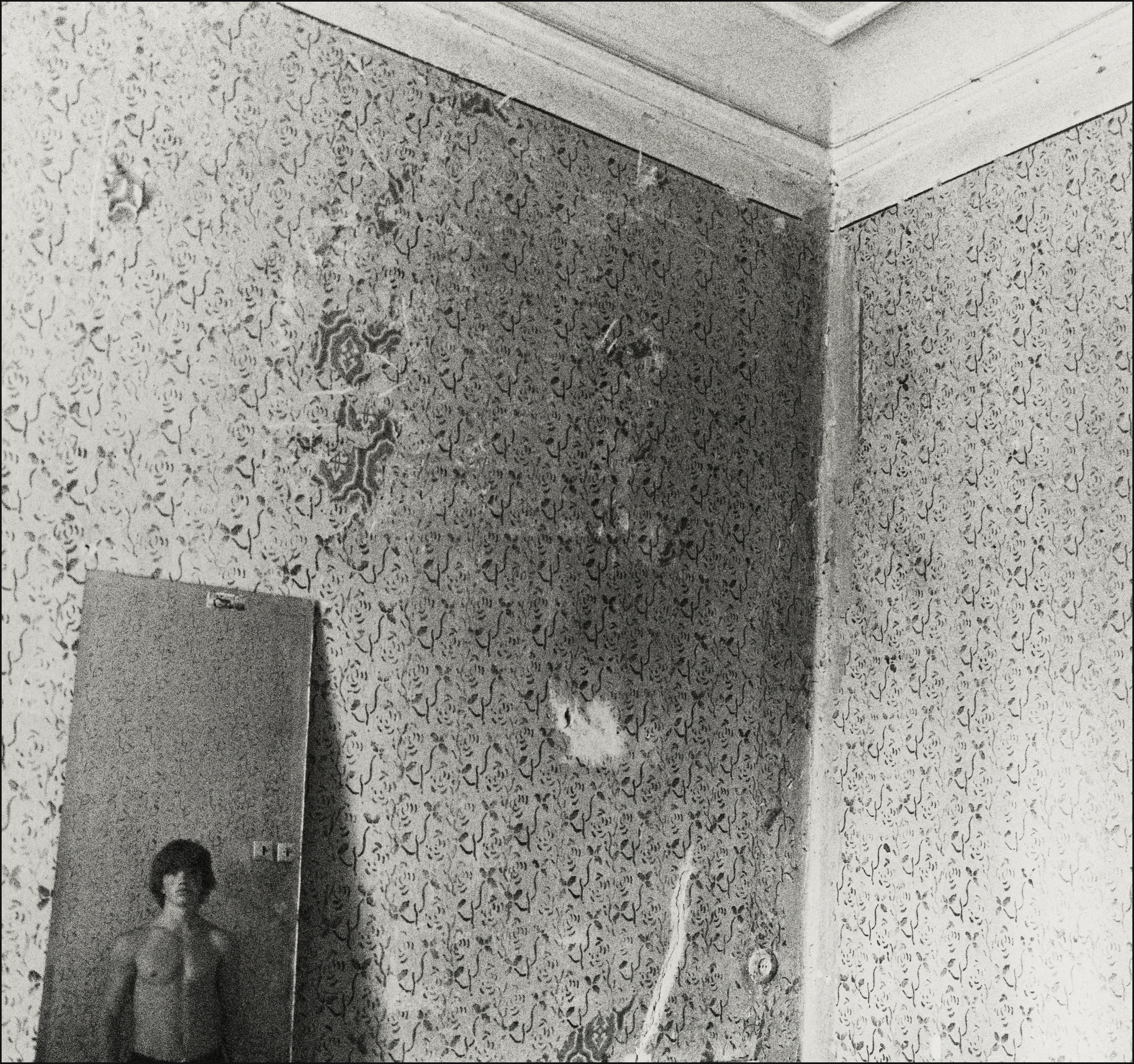 Black and white rude boy. Portrait in a mirror.