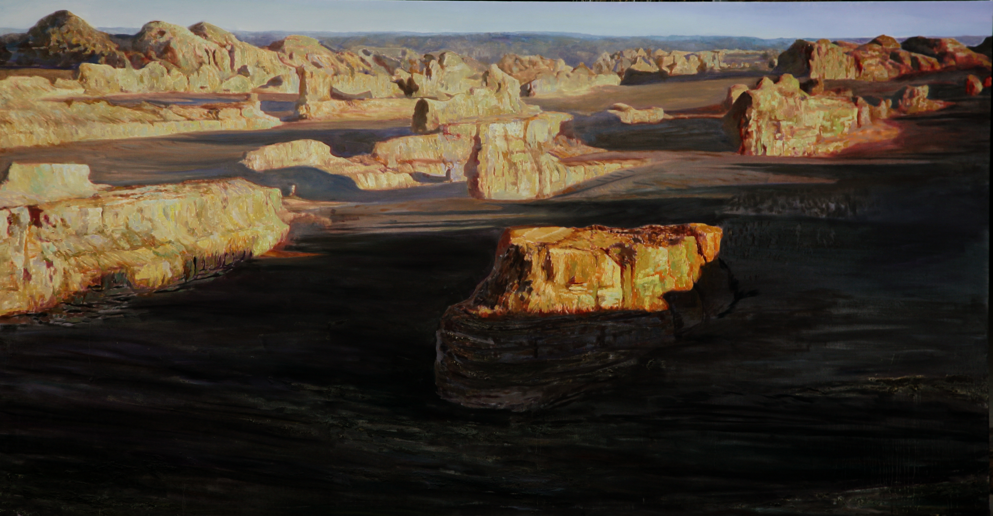 Golden sands caress the Yardang rocks,