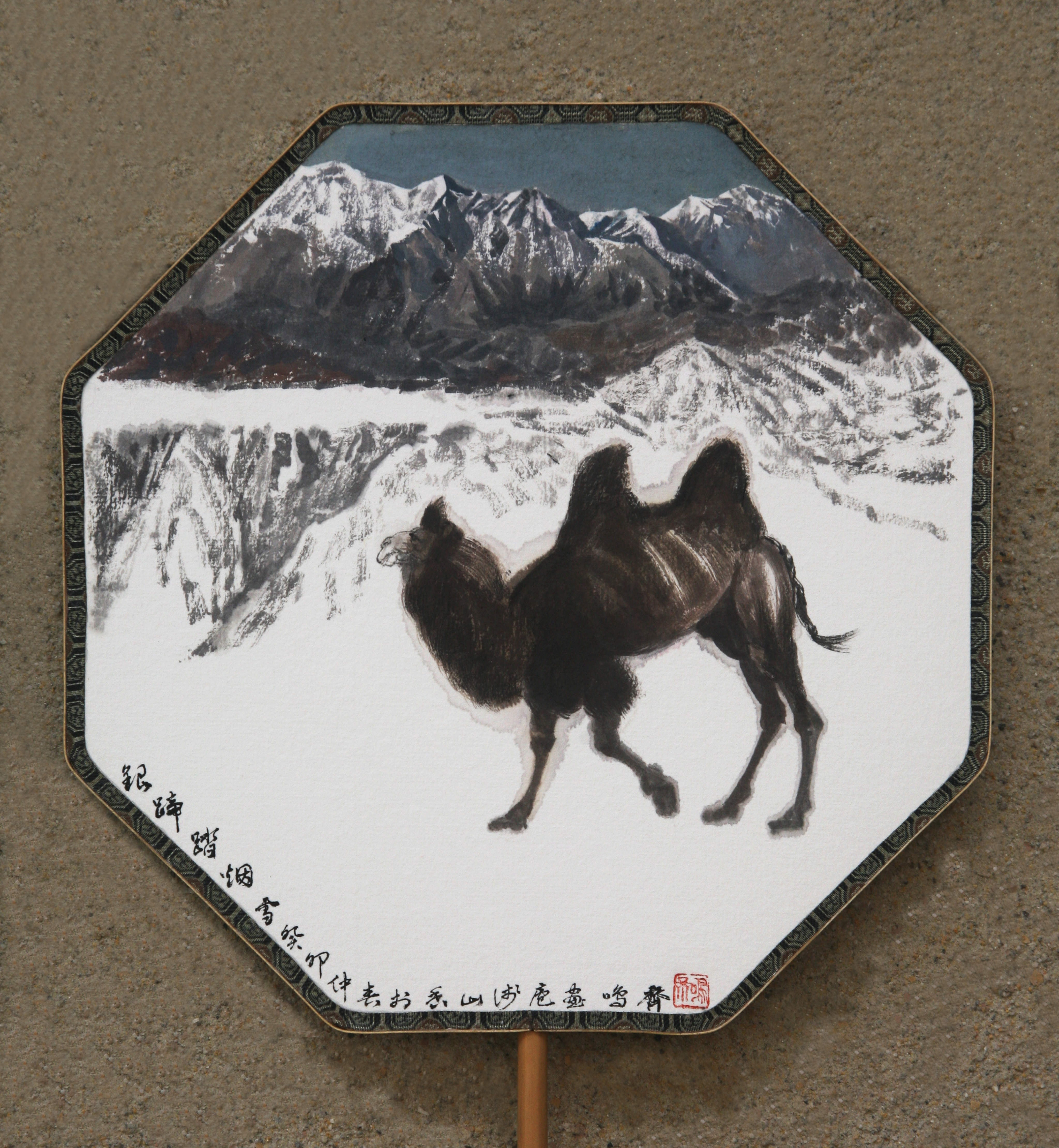 A Camel Wandering Alone in Snowy Mountain