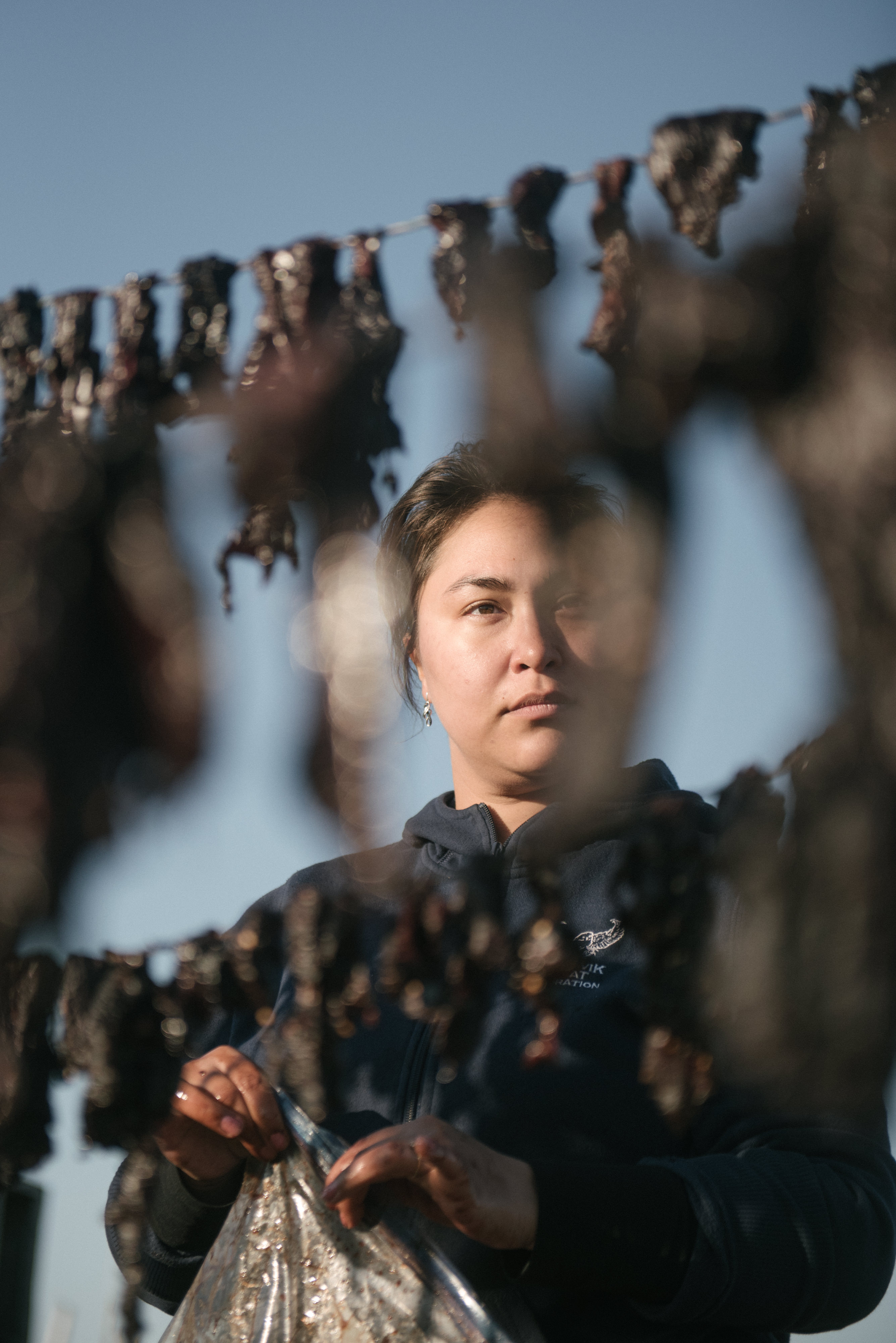 Rumors of Arctic Belonging - Portrait of Cathy Peacock, drying tuutuu