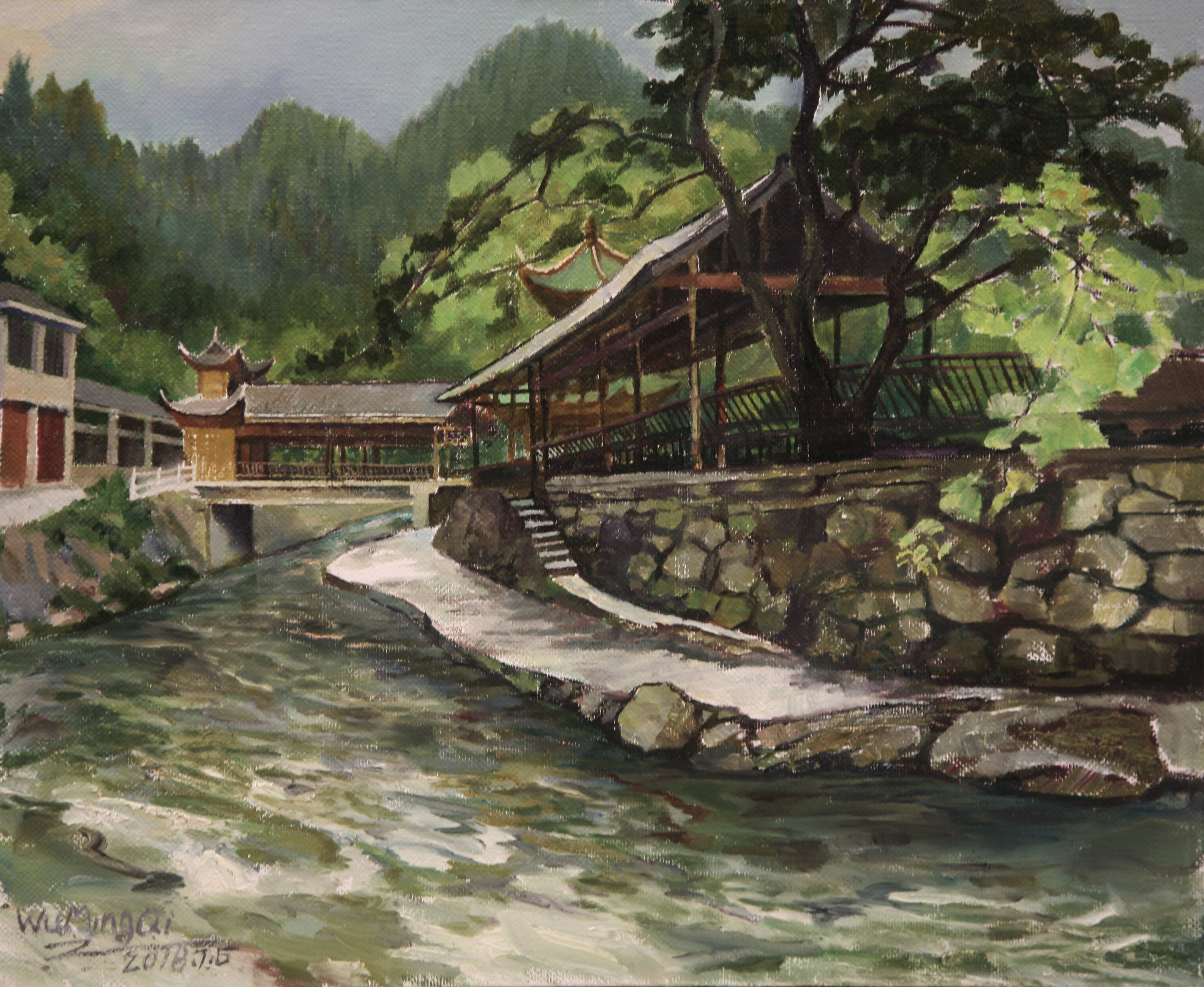 In Zhenyuan, the covered bridge rests quietly over the water,